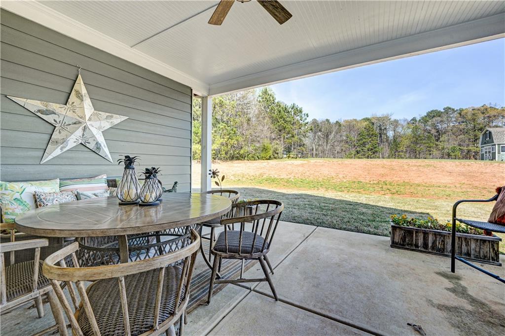 670 Poplar Street Monroe, GA 30655 - Photo 19 of 26 a view of a outdoor space with seating area
