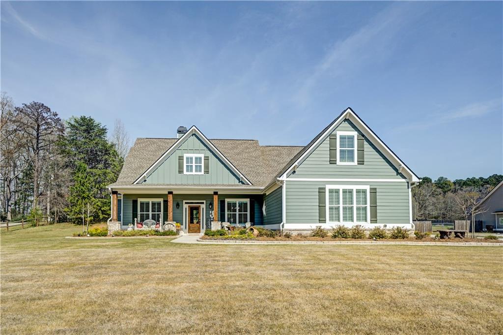 670 Poplar Street Monroe, GA 30655 - Photo 2 of 26 a front view of a house with a yard
