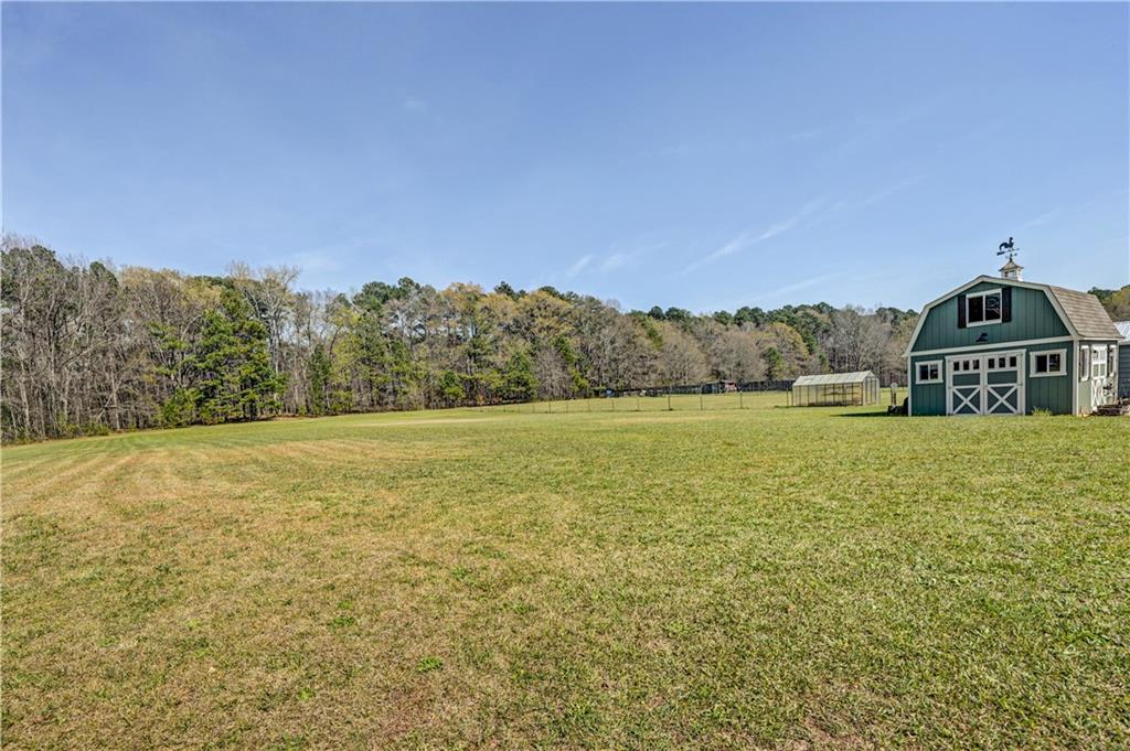 670 Poplar Street Monroe, GA 30655 - Photo 25 of 26 a view of a yard