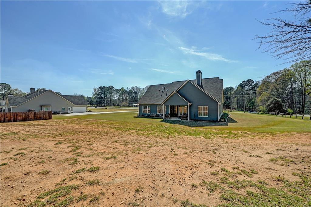 670 Poplar Street Monroe, GA 30655 - Photo 26 of 26 a front view of a house with a yard