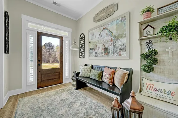 a bedroom with furniture and a window