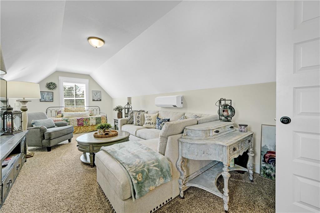 670 Poplar Street Monroe, GA 30655 - Photo 9 of 26 a view of a livingroom with furniture and a livingroom
