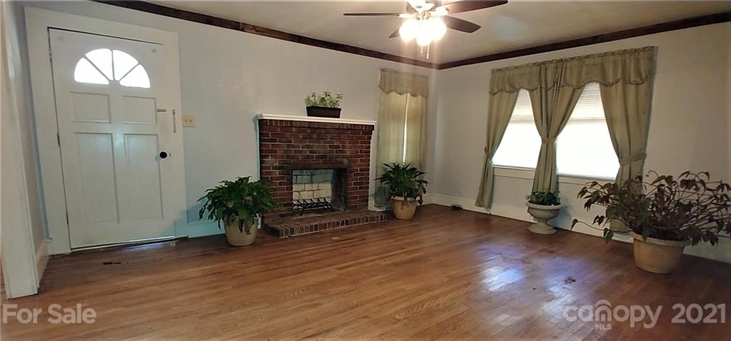 1138 Old York Road Chester, SC 29706 - Photo 4 of 28 wooden floor in an empty room with a window