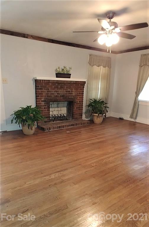 1138 Old York Road Chester, SC 29706 - Photo 5 of 28 a living room with furniture and a fireplace