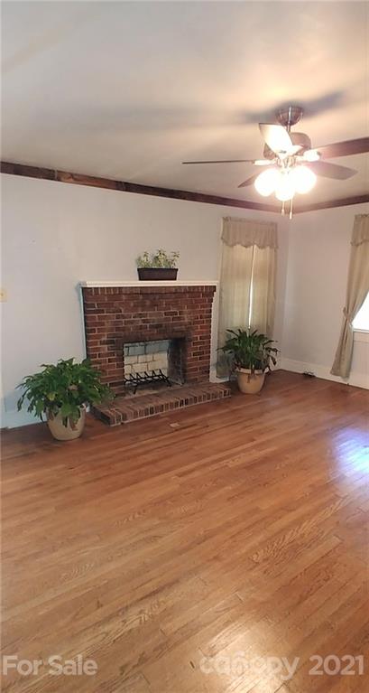 1138 Old York Road Chester, SC 29706 - Photo 6 of 28 a living room with furniture and a fireplace