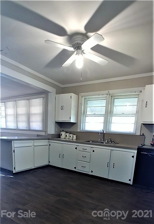 1138 Old York Road Chester, SC 29706 - Photo 10 of 28 a kitchen with granite countertop a stove a sink and cabinets