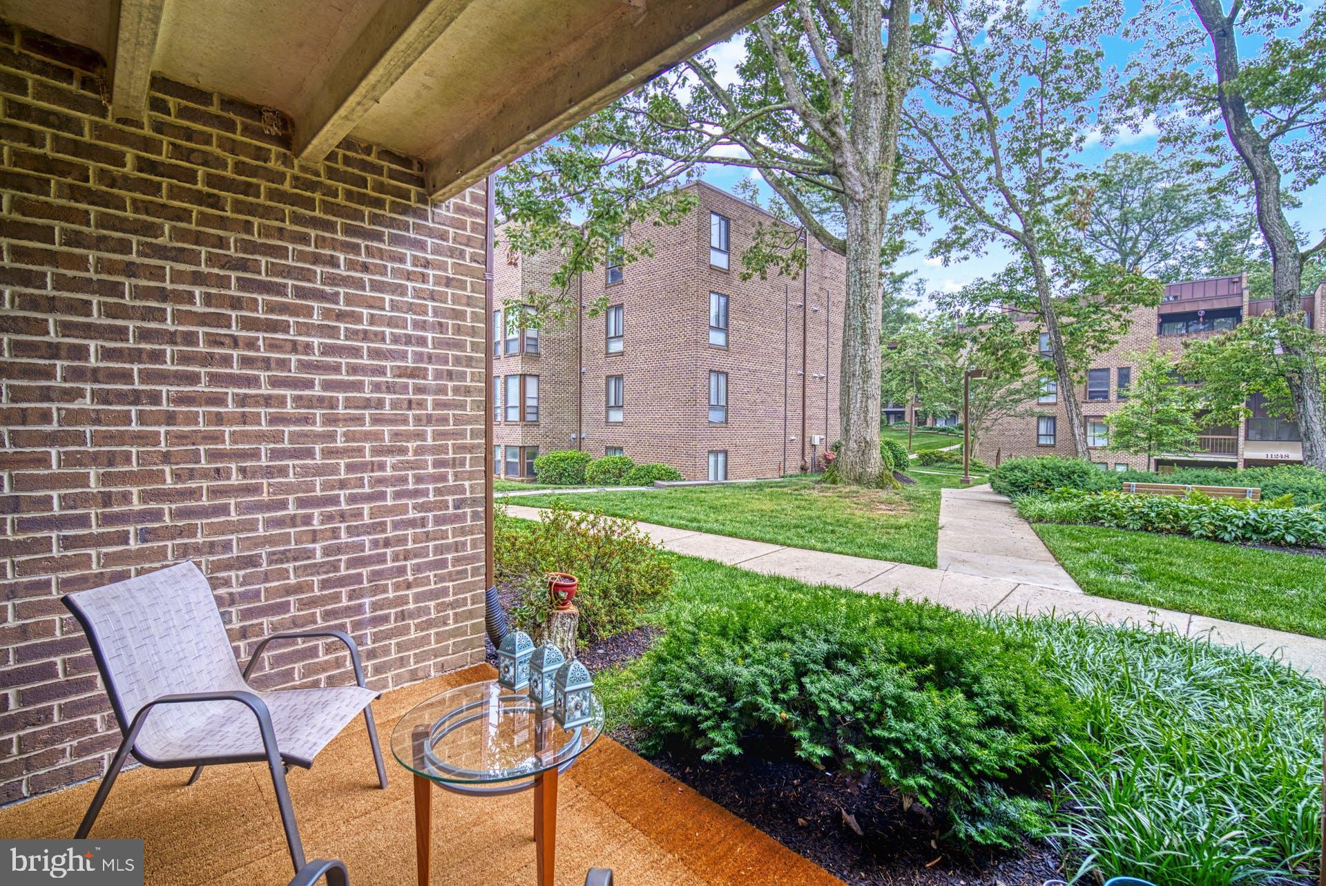 11236 Chestnut Grove Square, Unit 11236164 Reston, VA 20190 - Photo 21 of 45 Patio looks out to courtyard