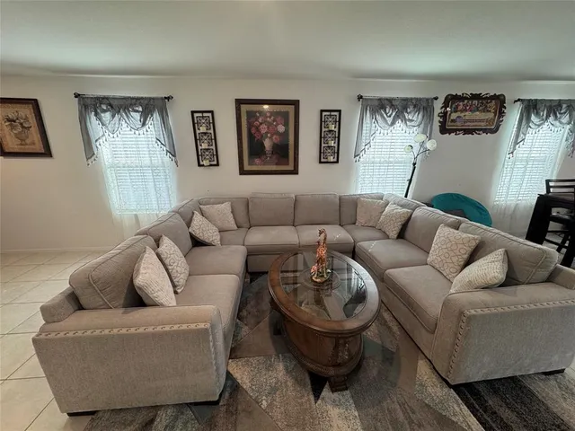 a living room with furniture and a couch