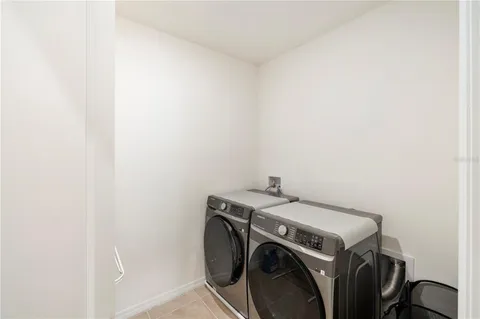 a view of a bathroom from a hallway