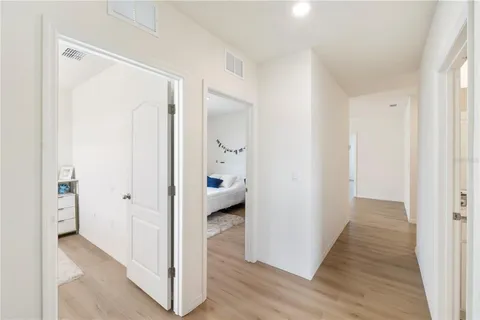 a bedroom with a bed and a table