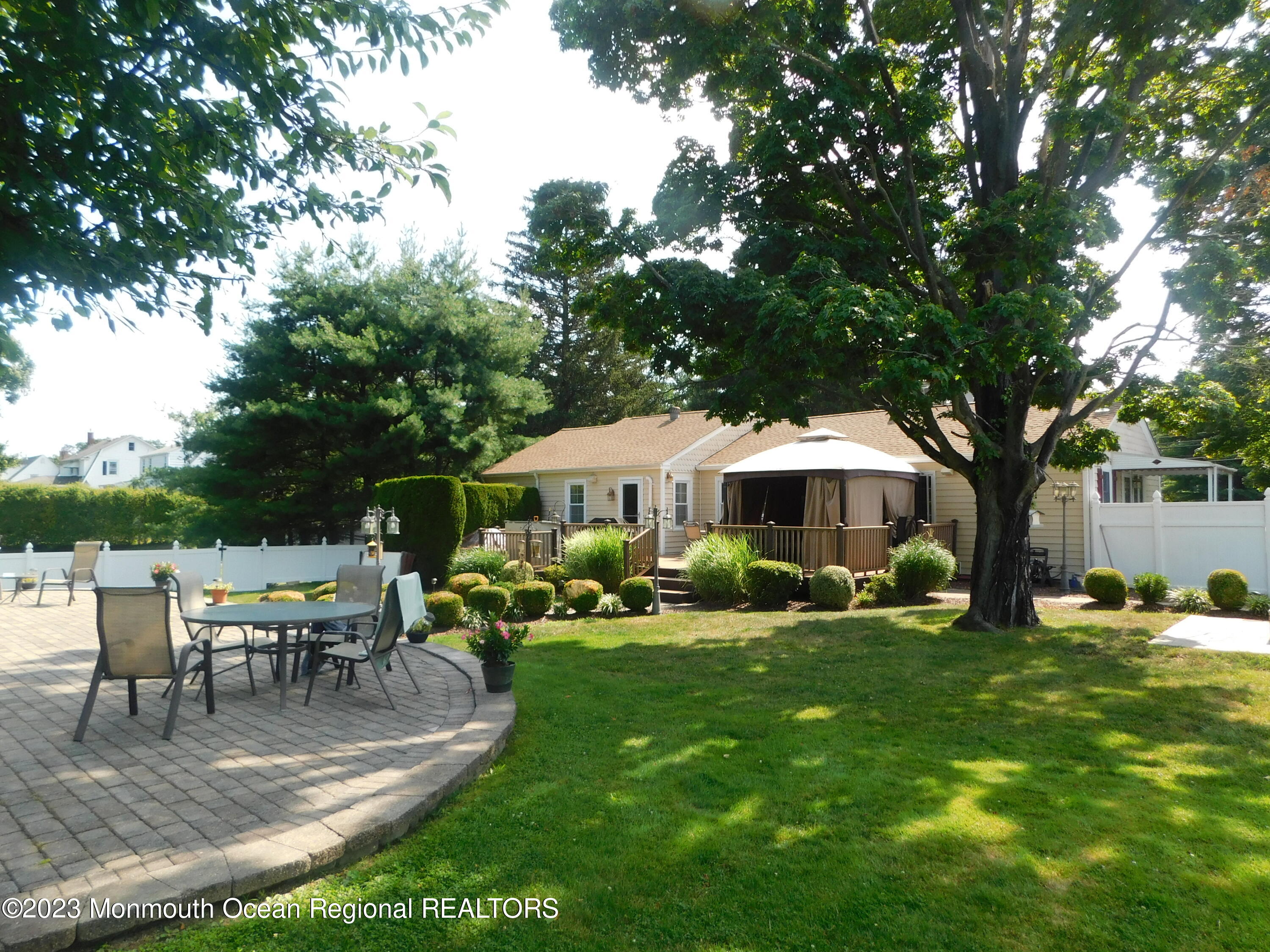 295 Broadway Freehold, NJ 07728 - Photo 32 of 39 a view of a house with backyard and sitting area