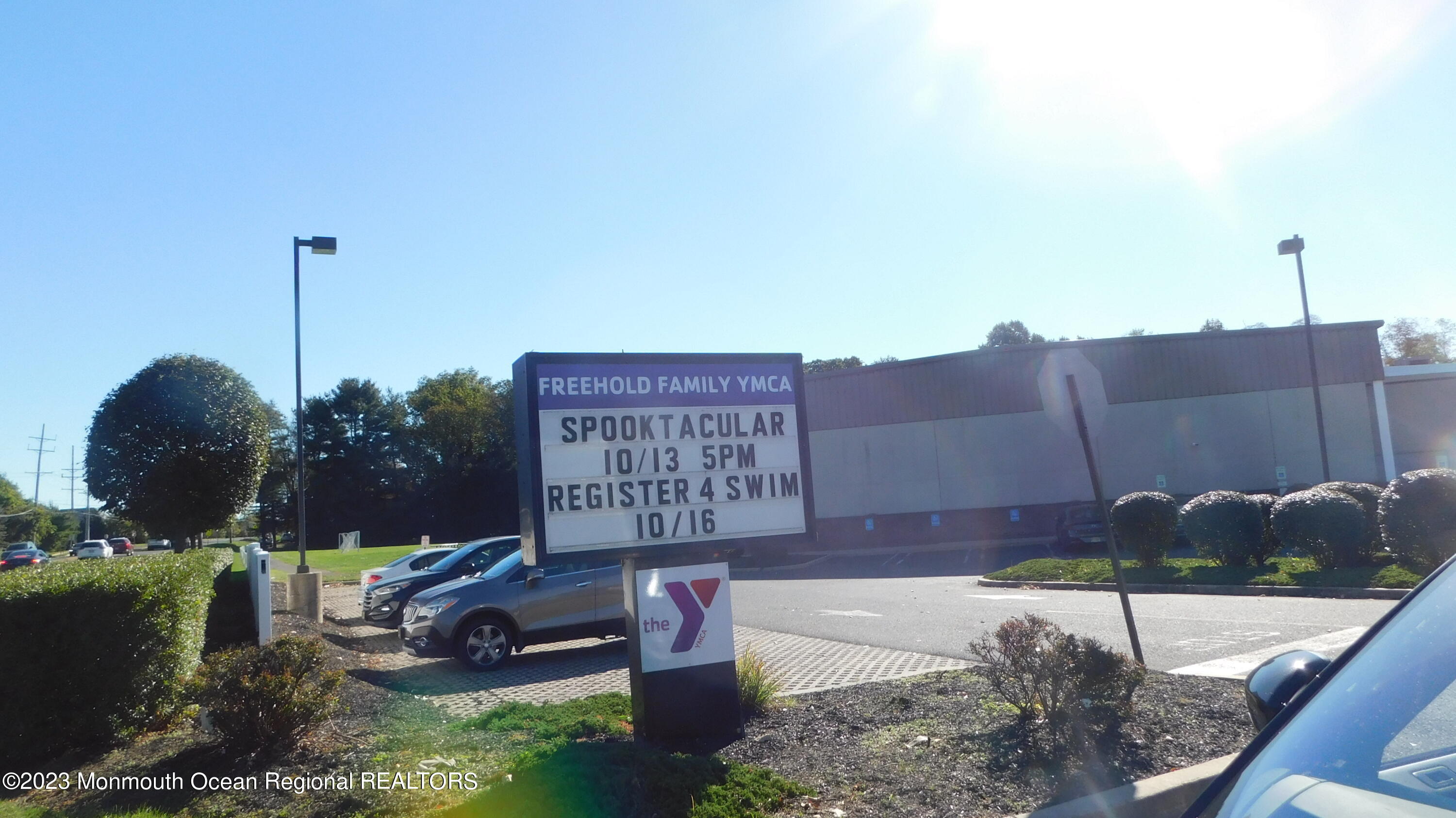 295 Broadway Freehold, NJ 07728 - Photo 37 of 39 a sign board with a yard and mountain