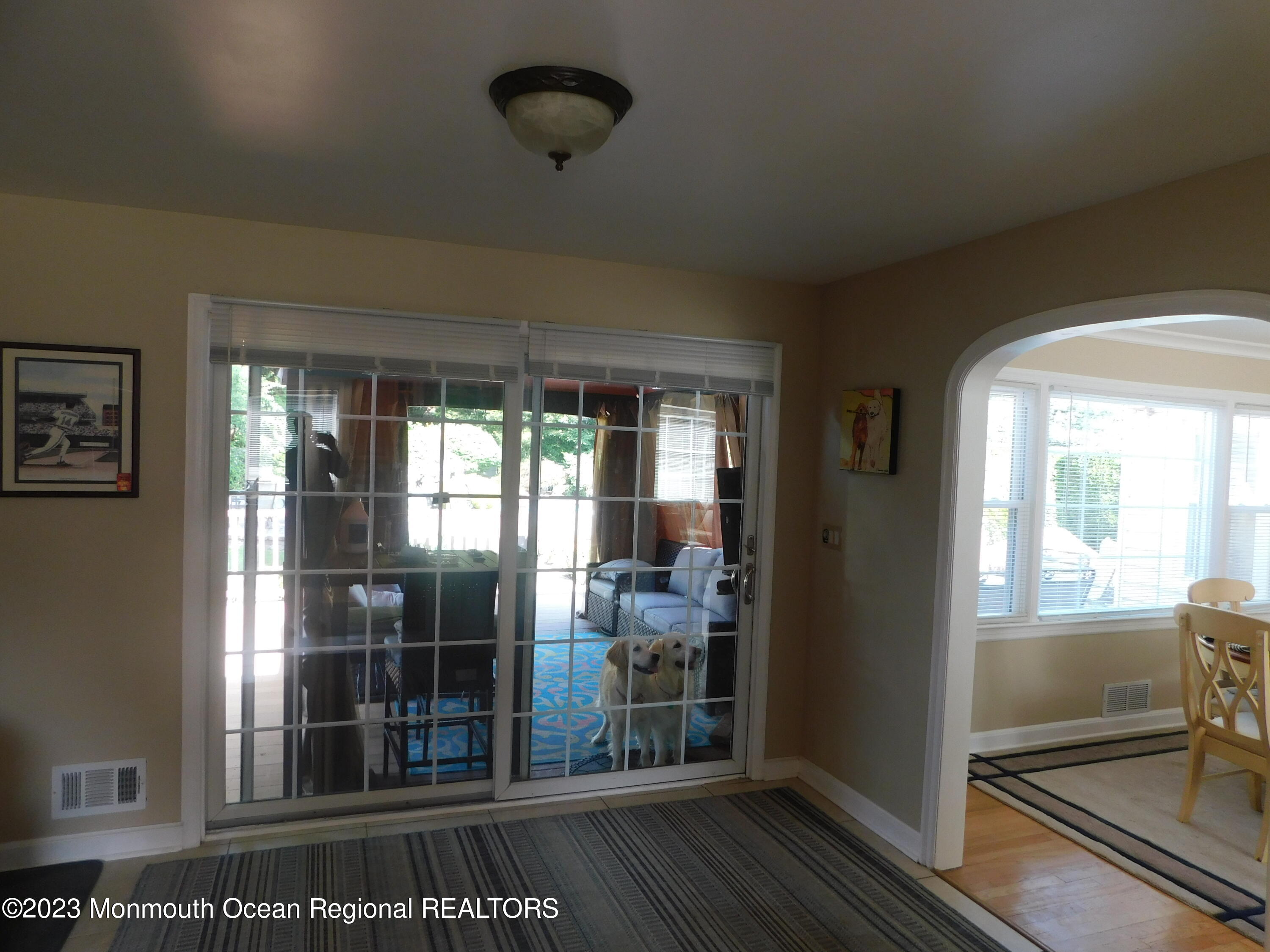 295 Broadway Freehold, NJ 07728 - Photo 5 of 39 a view of a room with wooden floor and windows