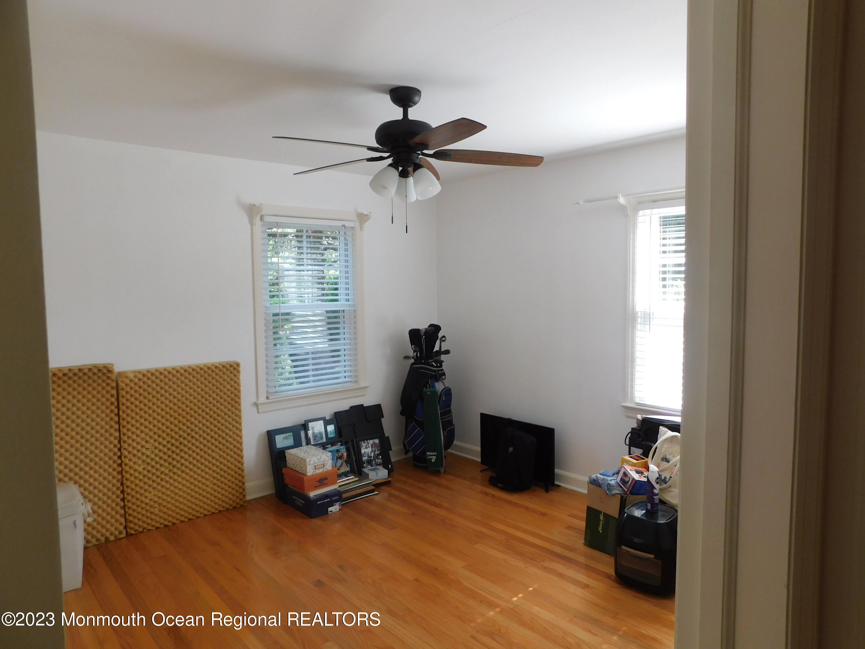 295 Broadway Freehold, NJ 07728 - Photo 10 of 39 a view of a livingroom with furniture and a window