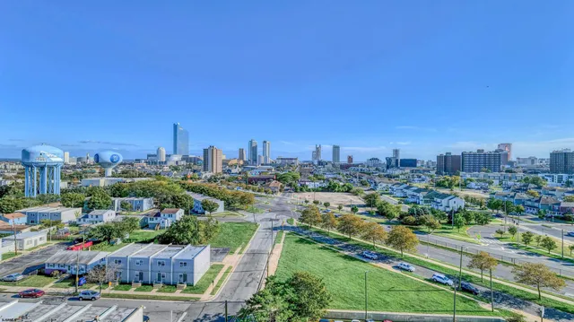 a view of a city with tall buildings