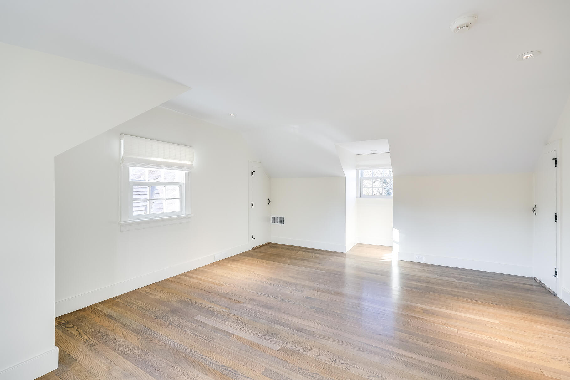 149 East Bay Road Osterville, MA 02655 - Photo 19 of 29 an empty room with wooden floor and windows
