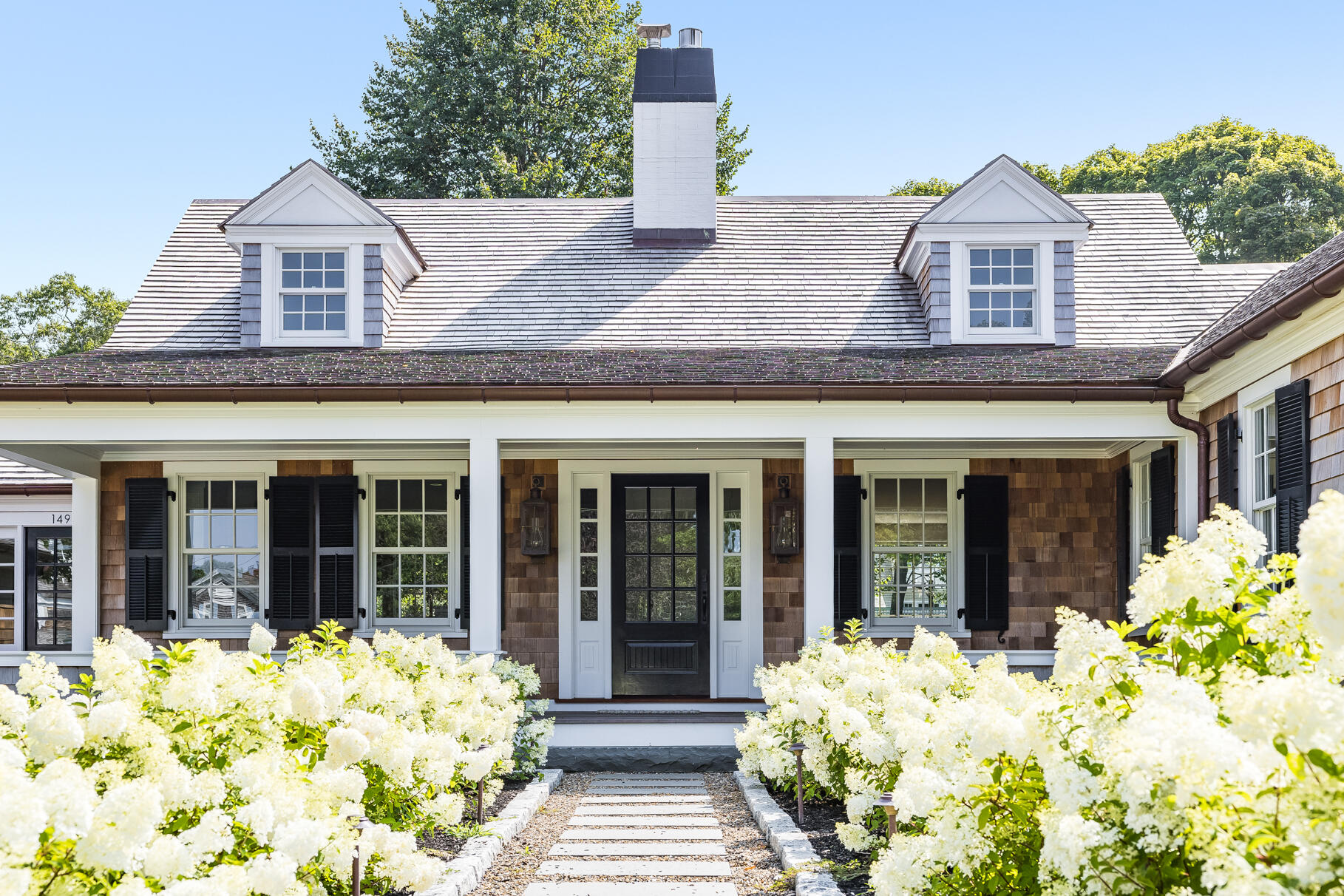 149 East Bay Road Osterville, MA 02655 - Photo 2 of 29 front view of a house with a yard