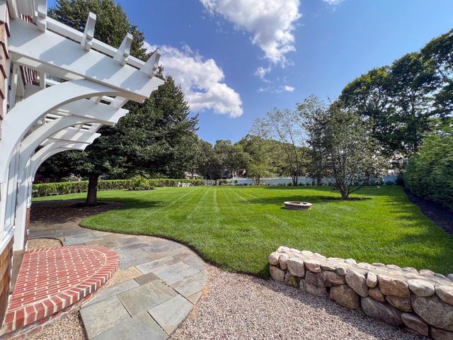 a view of a garden with an outdoor space