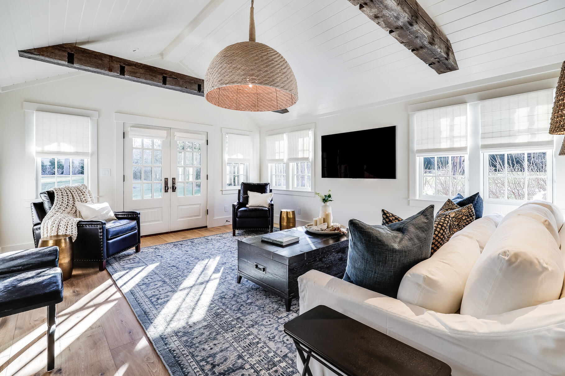 149 East Bay Road Osterville, MA 02655 - Photo 8 of 29 a living room with furniture a ceiling fan and a flat screen tv