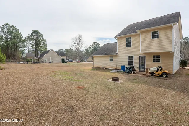 a view of the road and houses