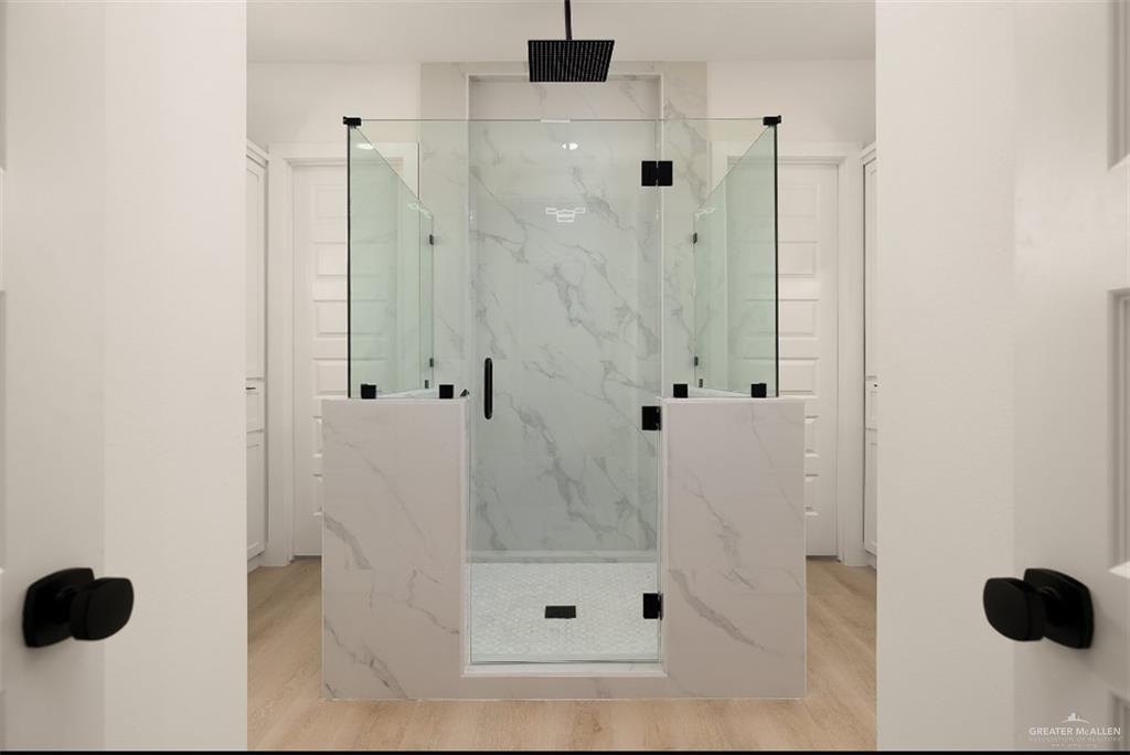 8003 North 55th Lane McAllen, TX 78573 - Photo 14 of 20 a bathroom with a shower