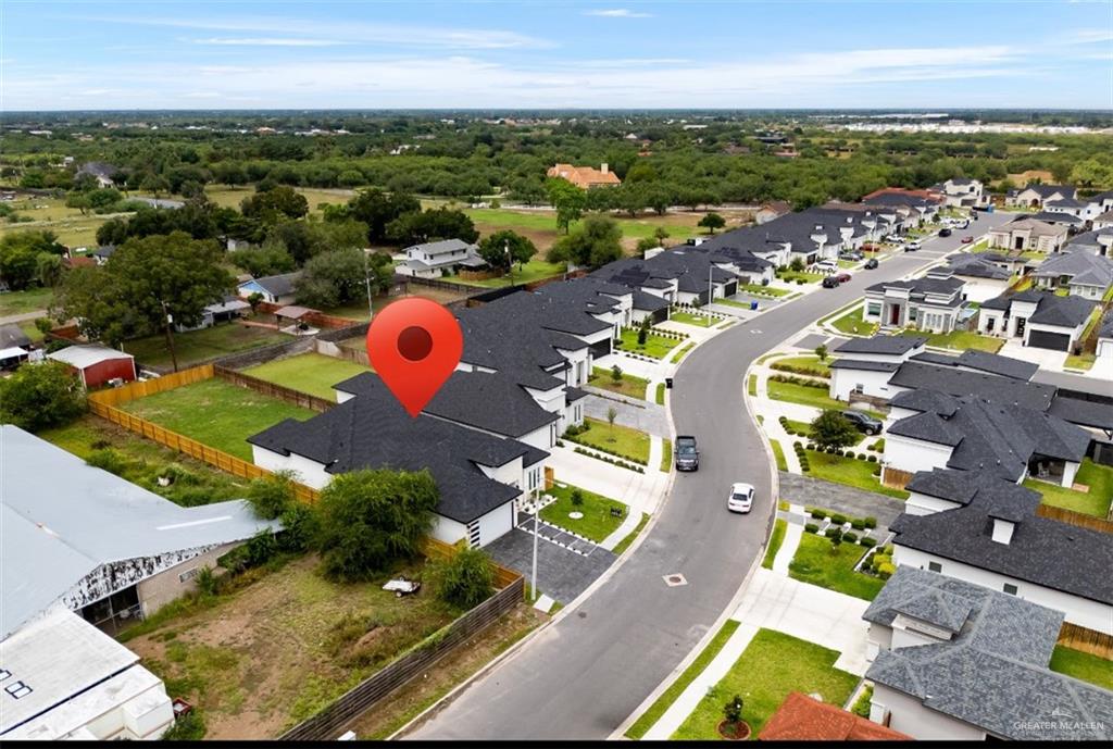 8003 North 55th Lane McAllen, TX 78573 - Photo 3 of 20 an aerial view of residential houses with outdoor space