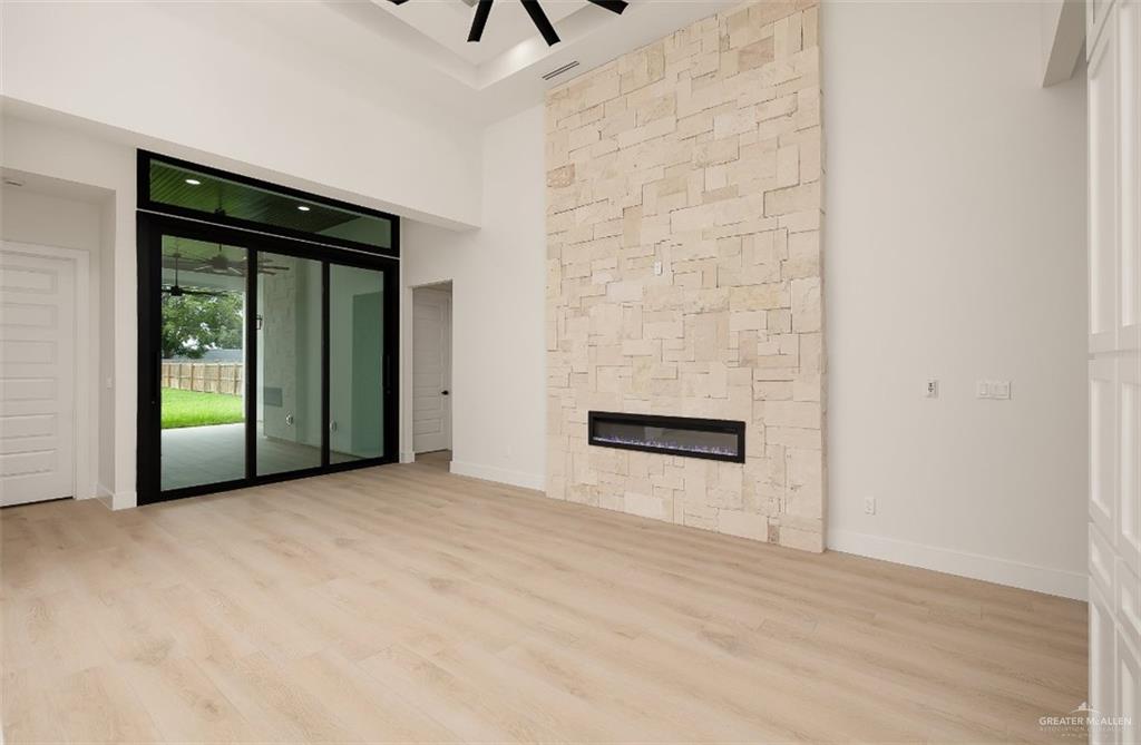 8003 North 55th Lane McAllen, TX 78573 - Photo 5 of 20 an empty room with windows and closet