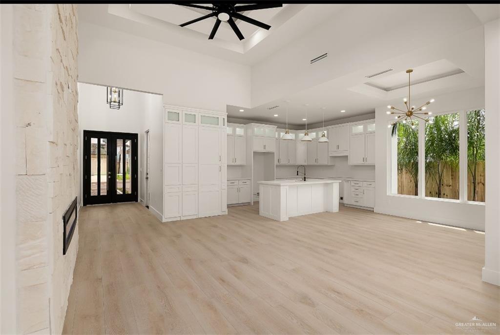 8003 North 55th Lane McAllen, TX 78573 - Photo 7 of 20 a view of a kitchen with a sink and a window