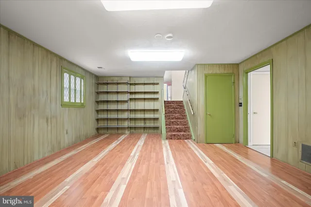 a view of entryway with wooden floor