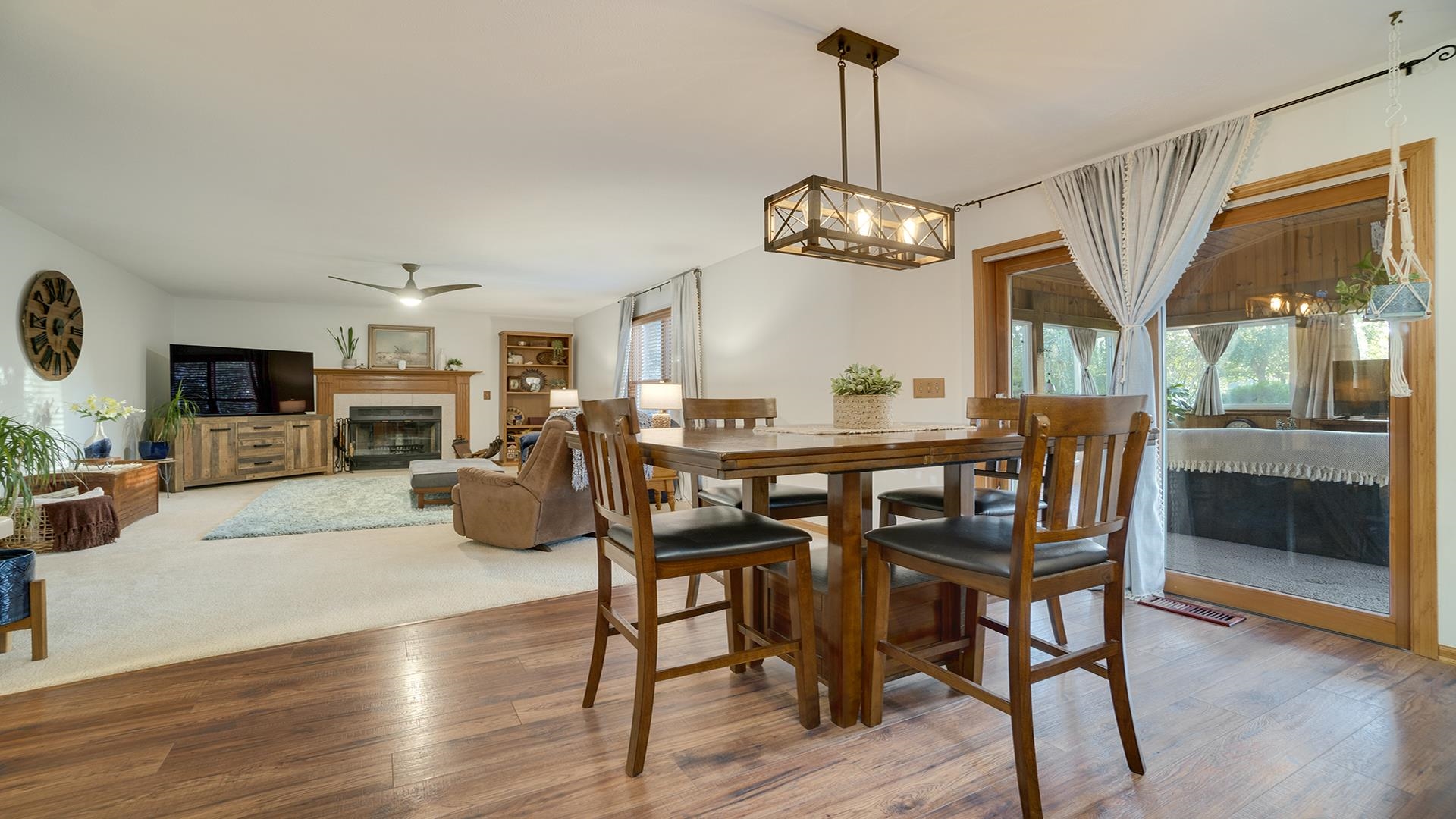604 Commander Place Belvidere, IL 61008 - Photo 17 of 40 a view of a dining room with furniture wooden floor and chandelier