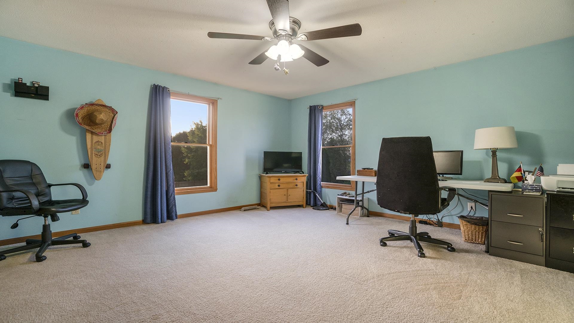 604 Commander Place Belvidere, IL 61008 - Photo 23 of 40 a view of a workspace with furniture and a window