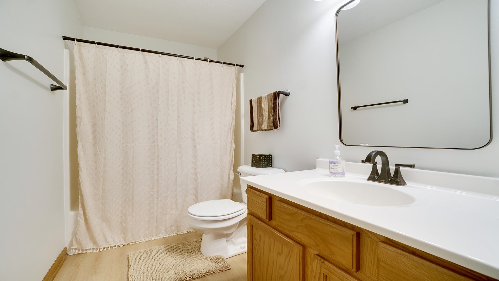 604 Commander Place Belvidere, IL 61008 - Photo 26 of 40 a bathroom with a sink a toilet and shower