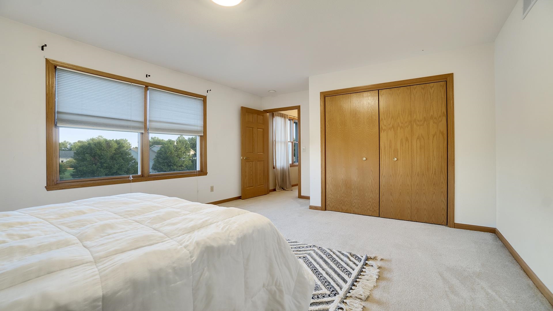 604 Commander Place Belvidere, IL 61008 - Photo 27 of 40 a bedroom with a bed and a window