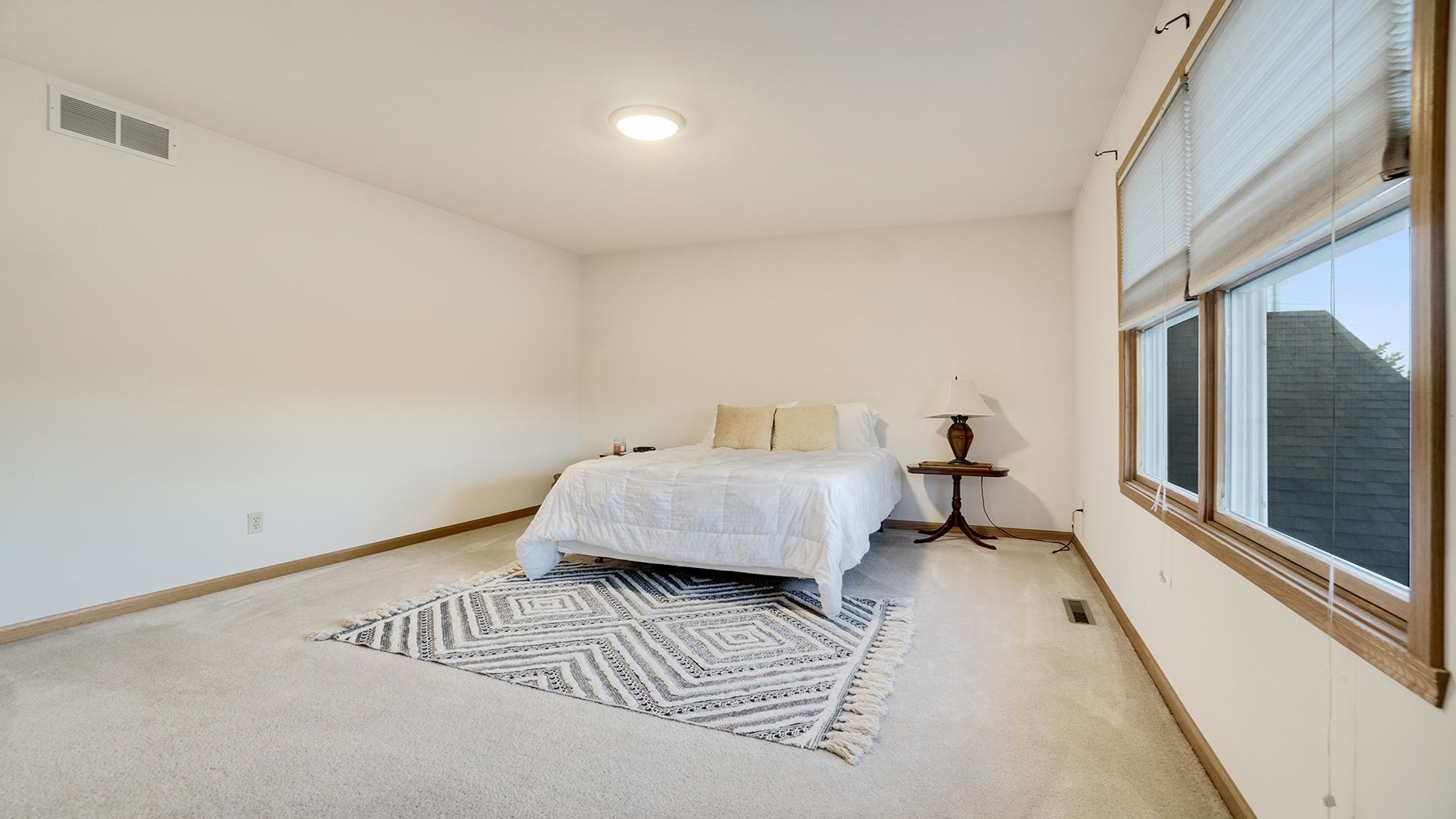 604 Commander Place Belvidere, IL 61008 - Photo 28 of 40 a bedroom with a bed and wooden floor