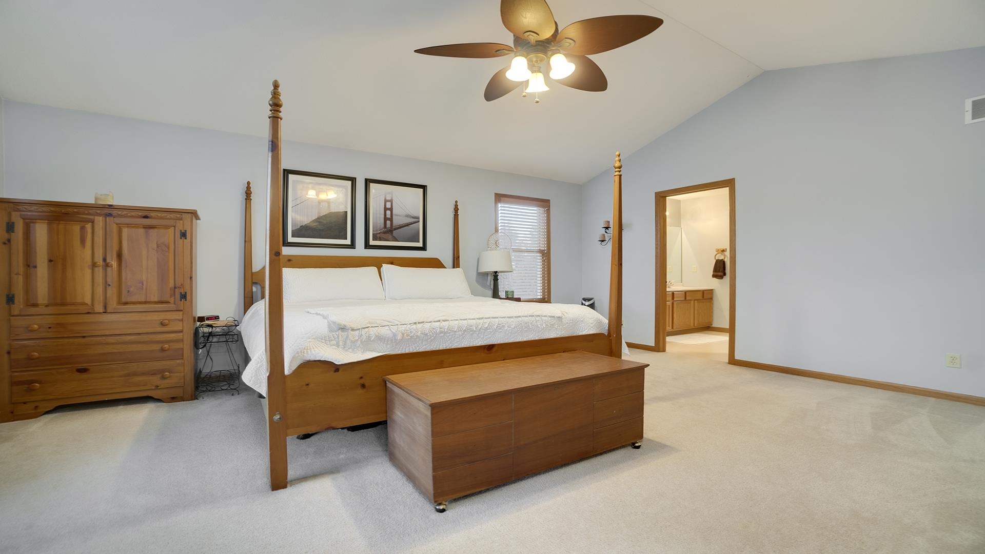 604 Commander Place Belvidere, IL 61008 - Photo 29 of 40 a bedroom with a bed and a chandelier