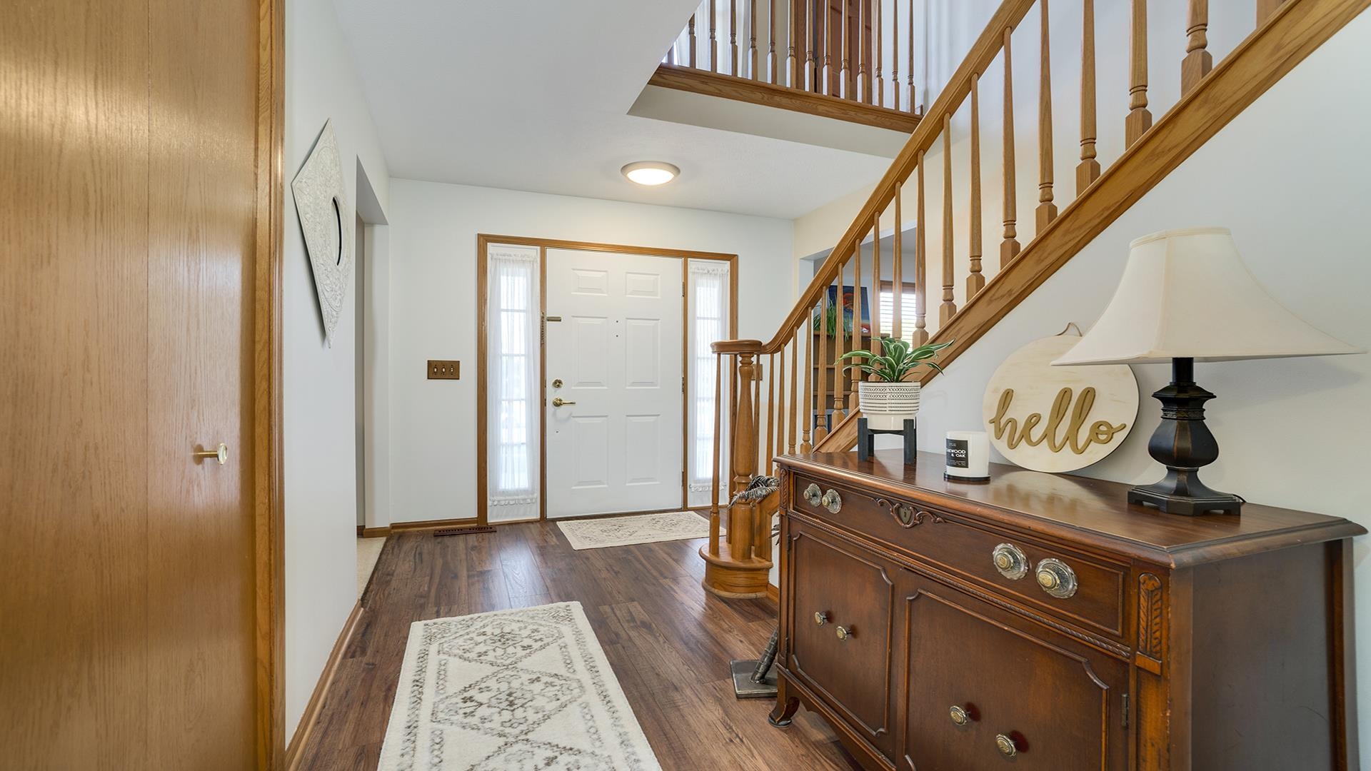 604 Commander Place Belvidere, IL 61008 - Photo 4 of 40 a view of entryway and hall with wooden floor