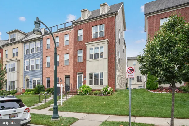a front view of a building with garden