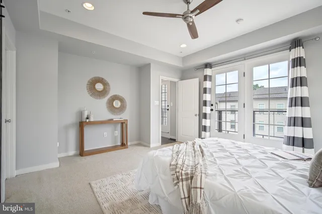 a bedroom with a bed and a cabinets