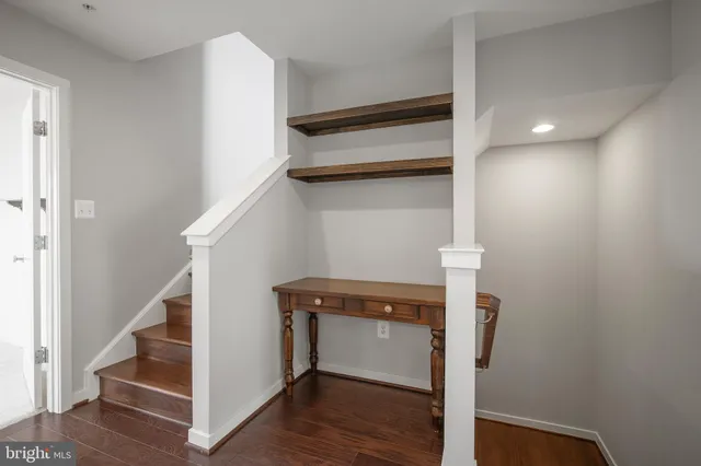 a view of entryway with wooden floor