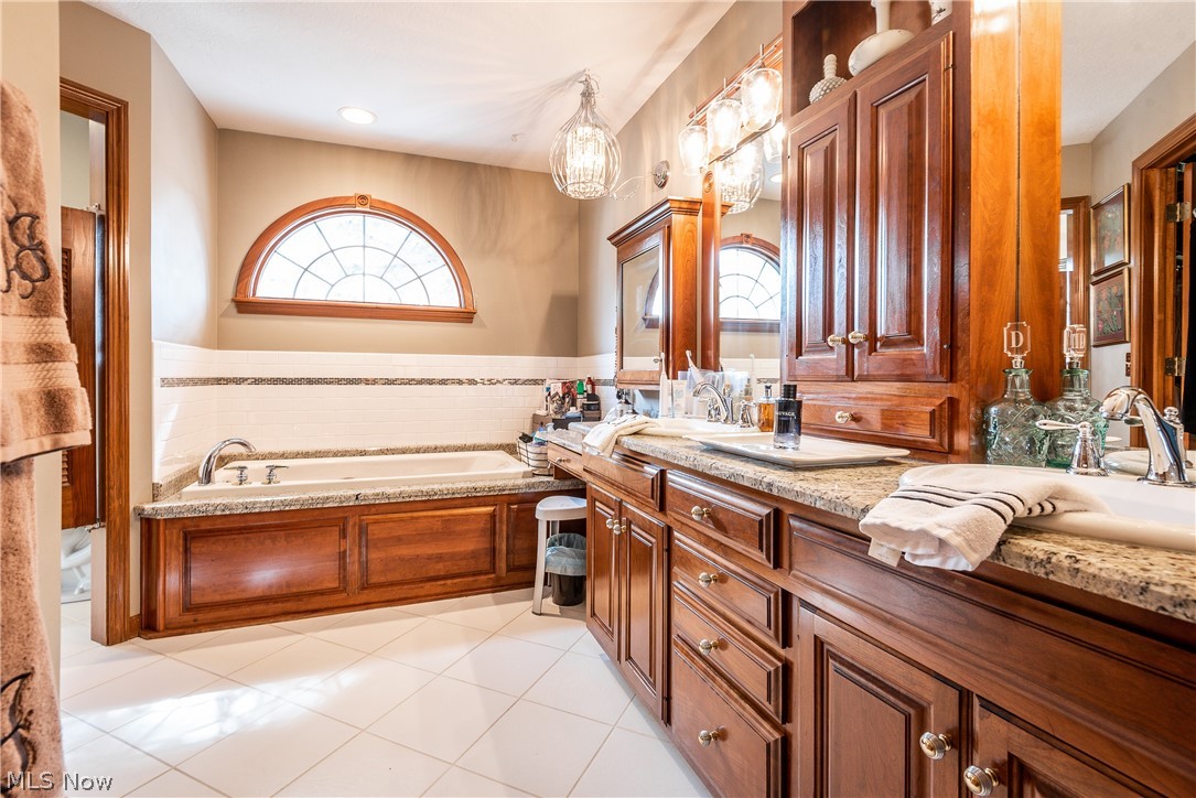 1814 Summerchase Road Northeast Canton, OH 44721 - Photo 20 of 34 Large bathroom has separate shower and tub
