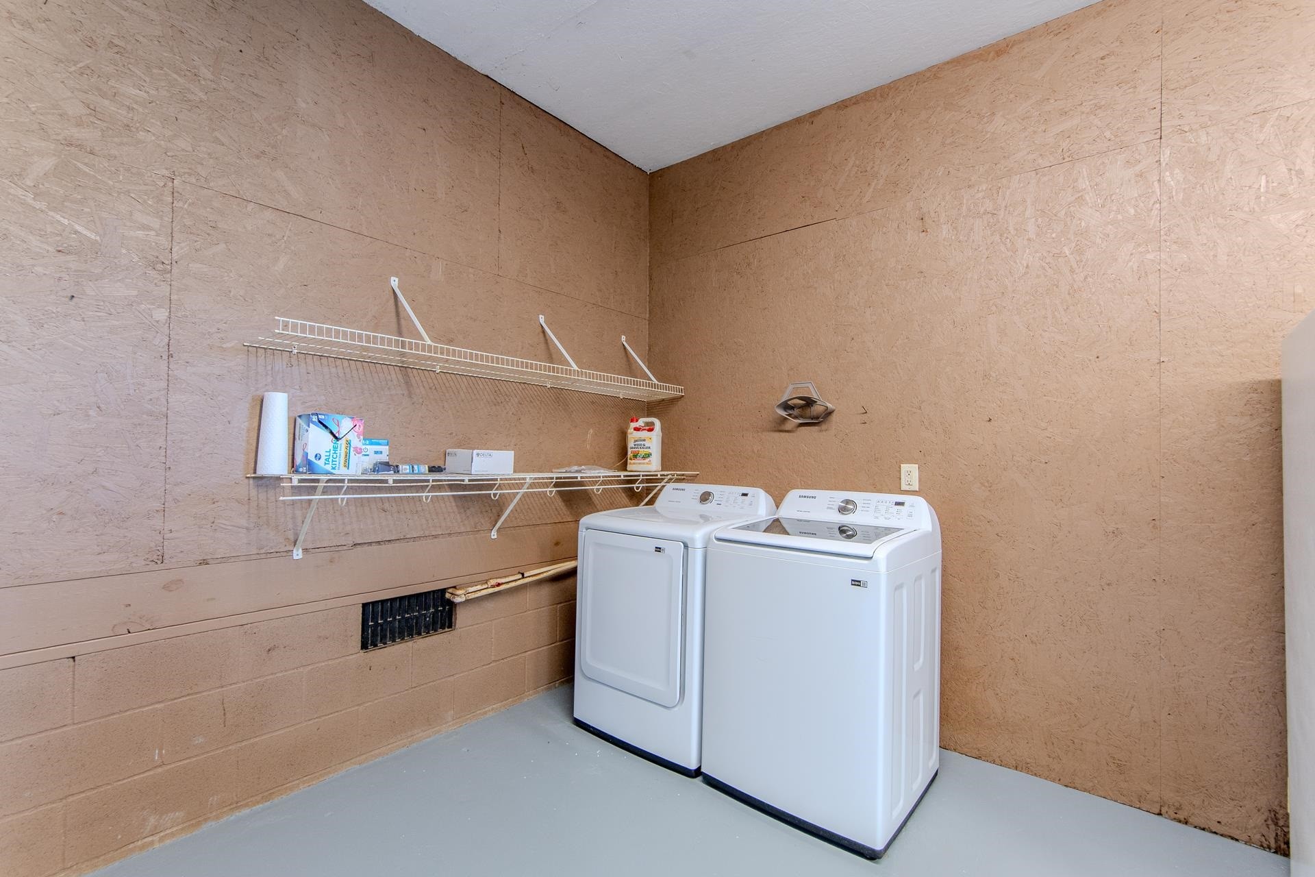 150 Hollis Way Adamsville, TN 38310 - Photo 24 of 37 a utility room with dryer and washer