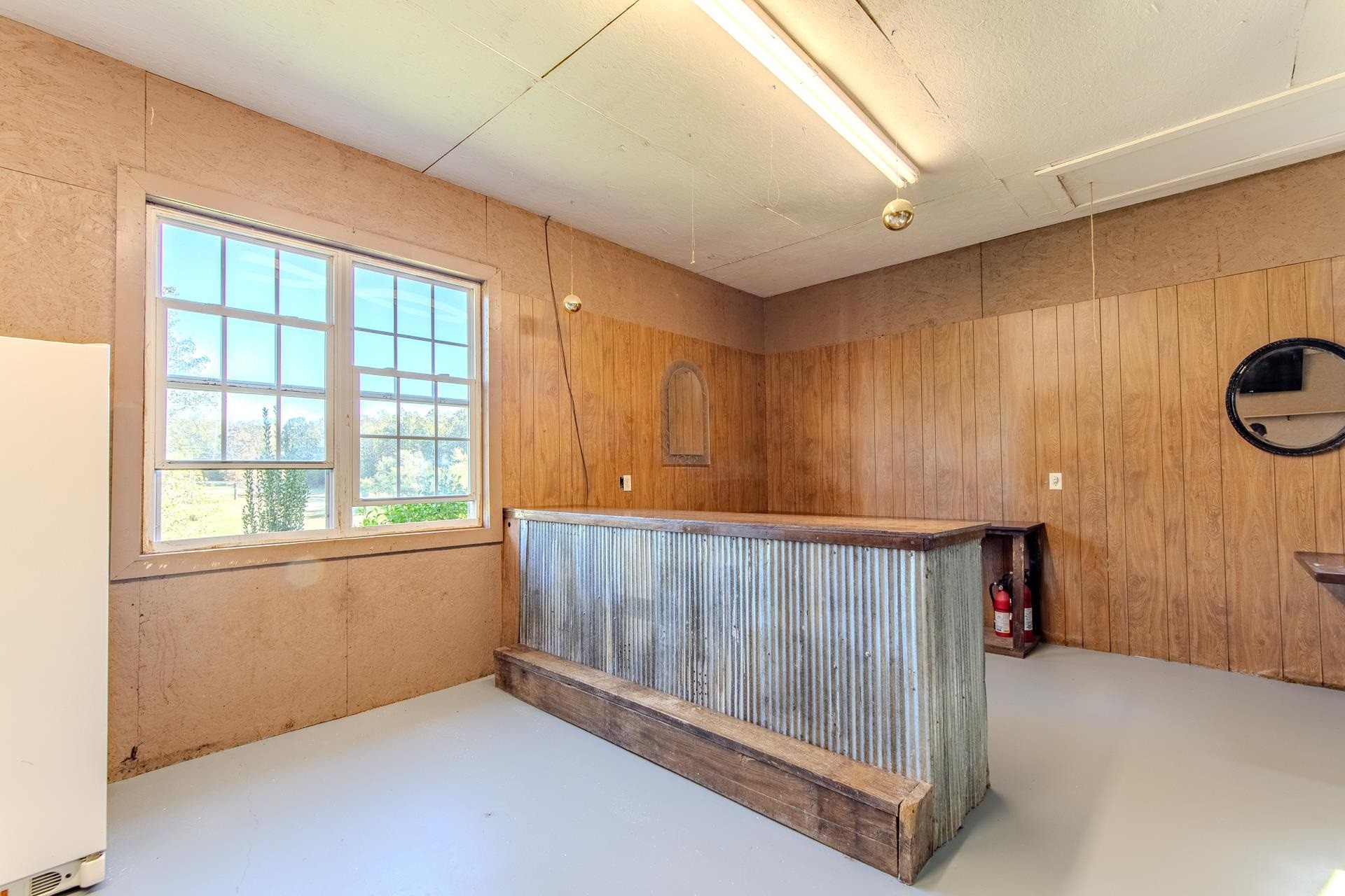 150 Hollis Way Adamsville, TN 38310 - Photo 27 of 37 a view of an empty room with a window
