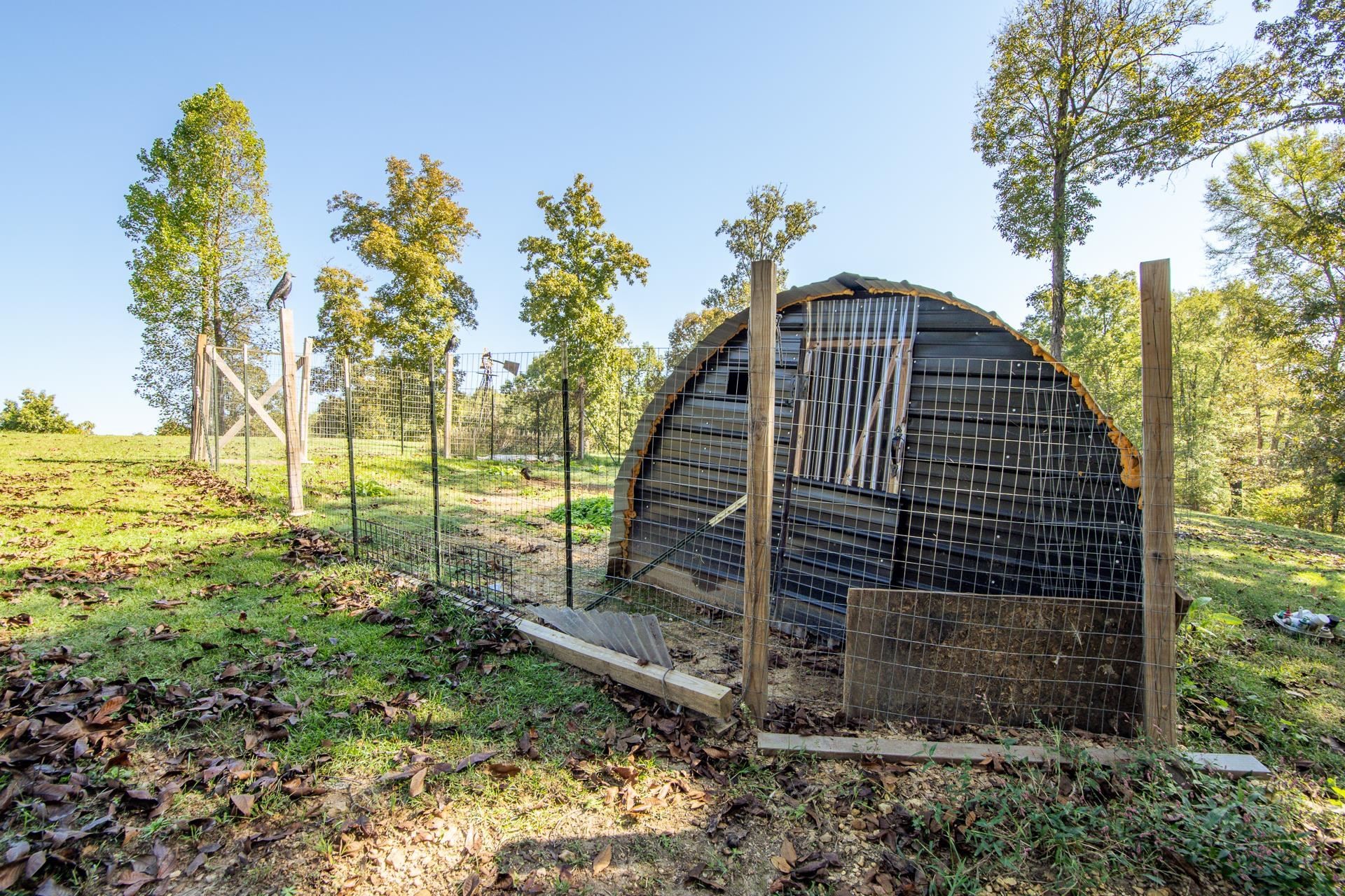 150 Hollis Way Adamsville, TN 38310 - Photo 36 of 37 a front view of a house with a yard