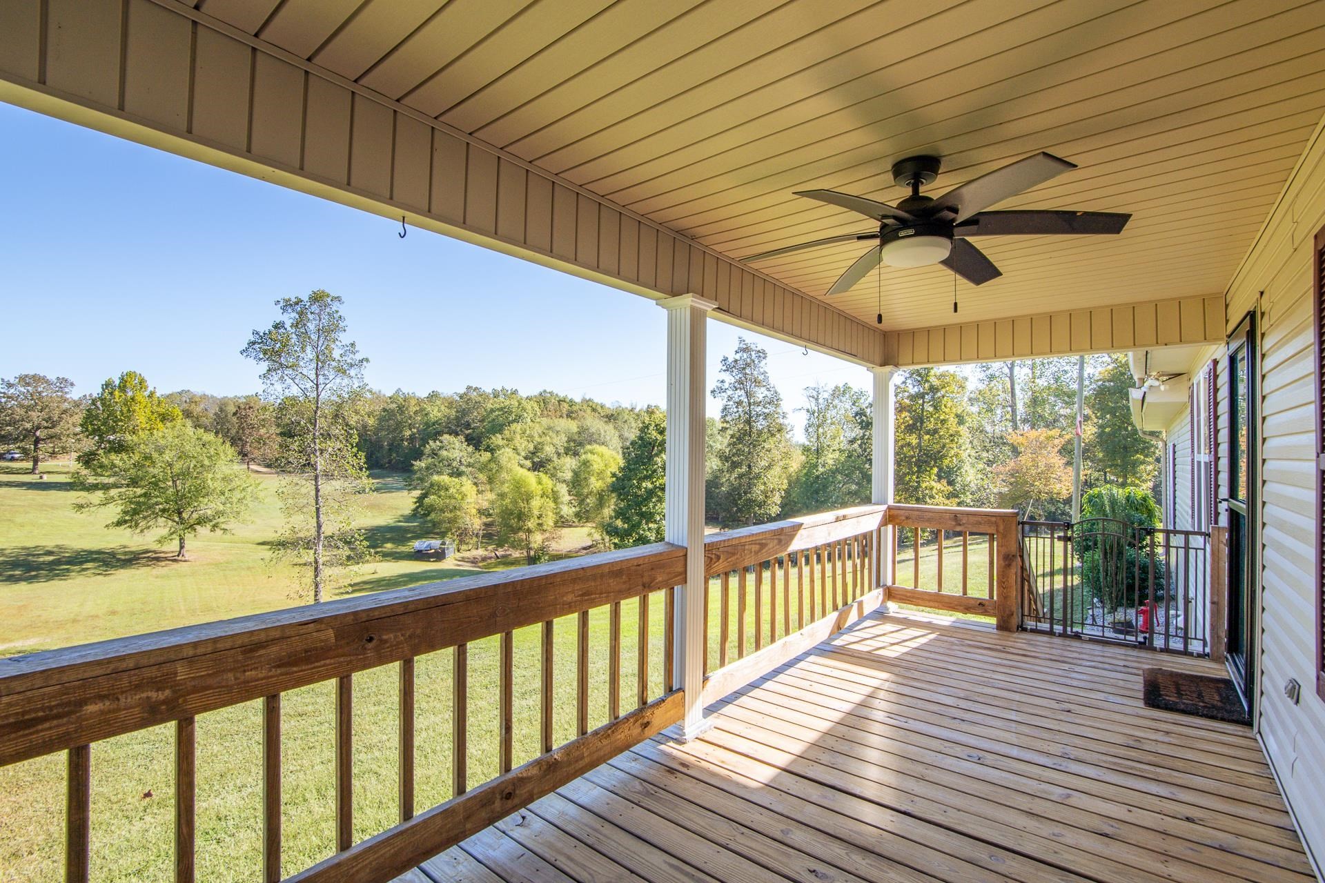150 Hollis Way Adamsville, TN 38310 - Photo 5 of 37 a view of a balcony with furniture