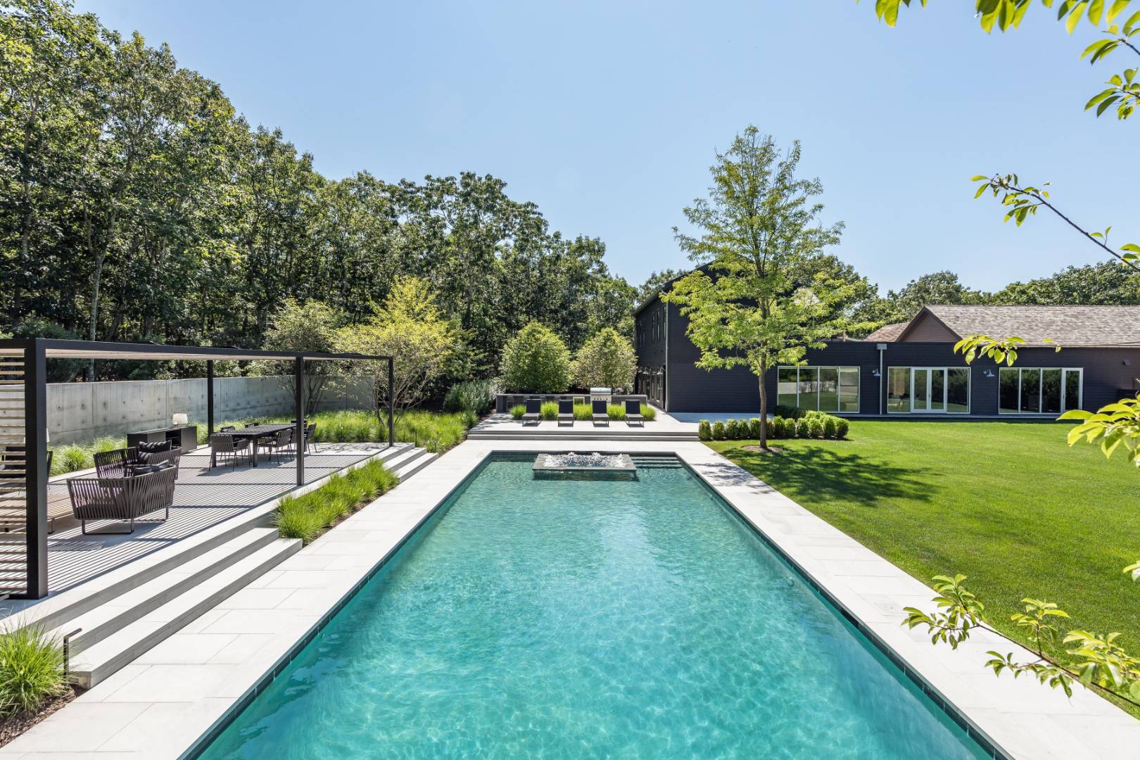 42 Old Noyack Path Sag Harbor, NY 11963 - Photo 2 of 43 a view of a house with swimming pool and sitting area