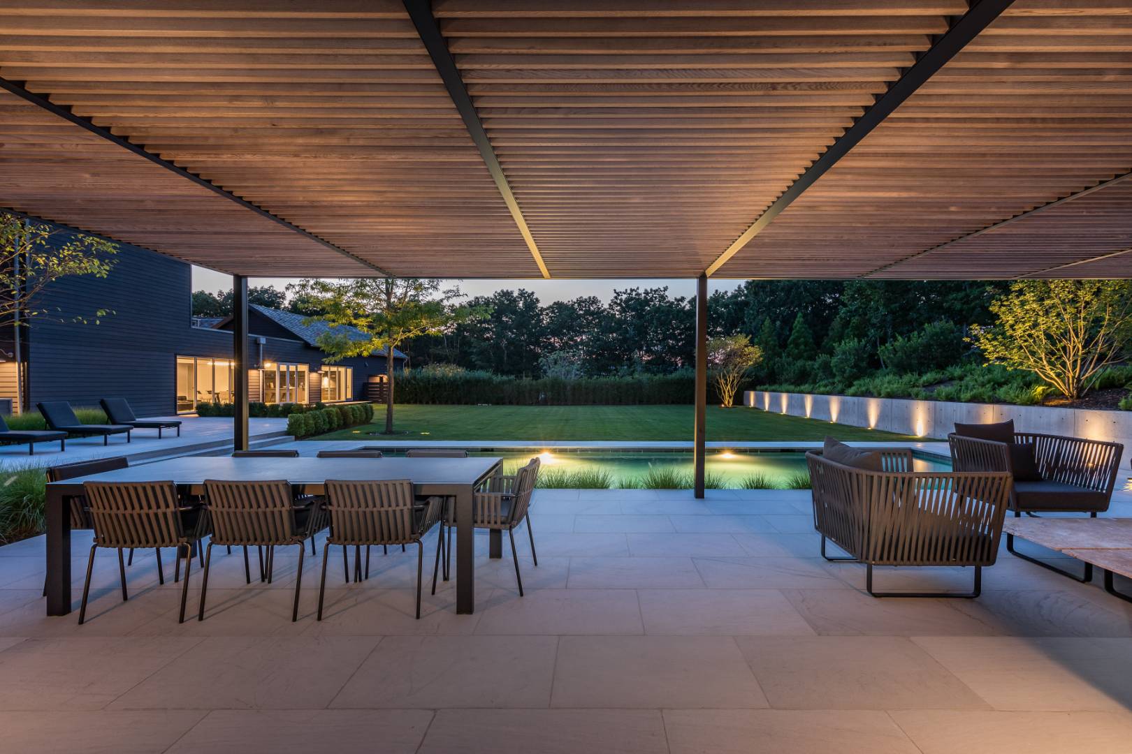 42 Old Noyack Path Sag Harbor, NY 11963 - Photo 3 of 43 a view of a patio with a table and chairs