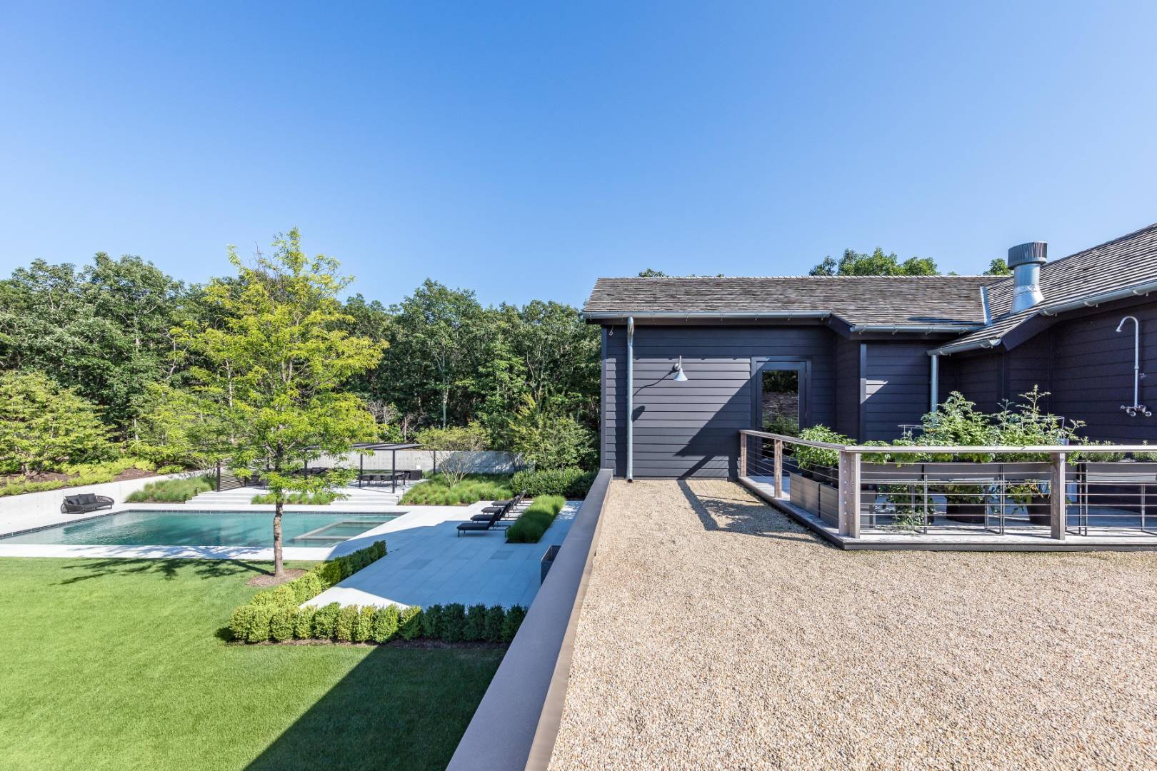 42 Old Noyack Path Sag Harbor, NY 11963 - Photo 23 of 43 a front view of a house with garden