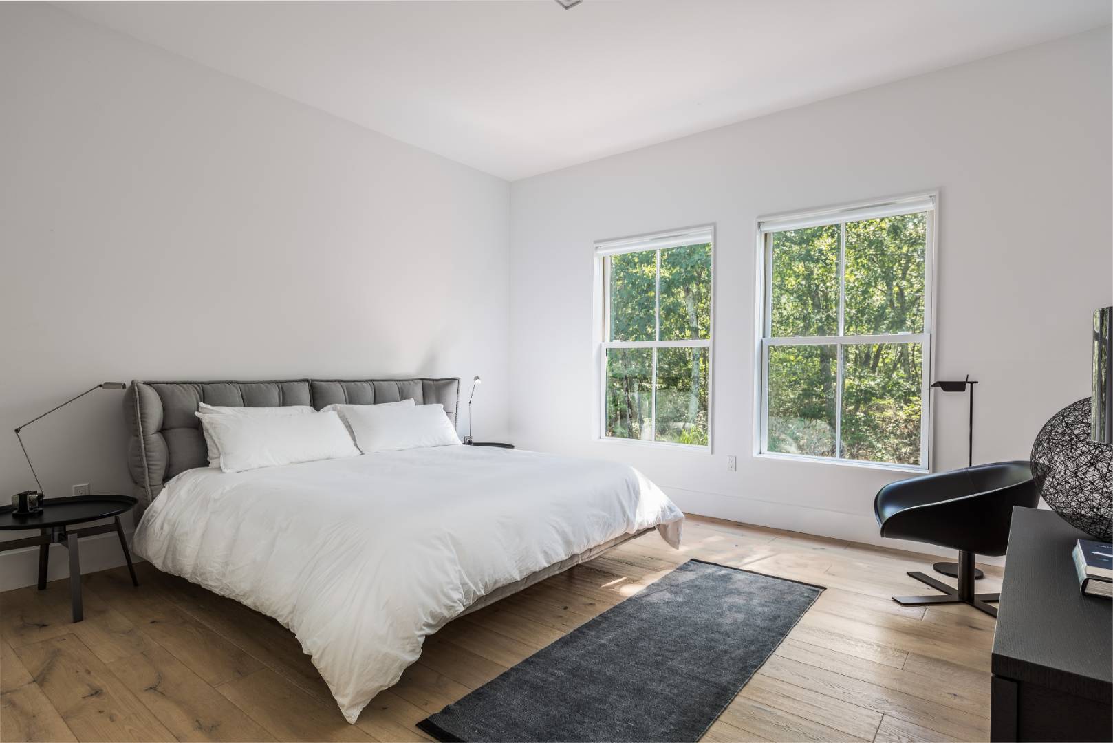 42 Old Noyack Path Sag Harbor, NY 11963 - Photo 25 of 43 a bedroom with a bed and window