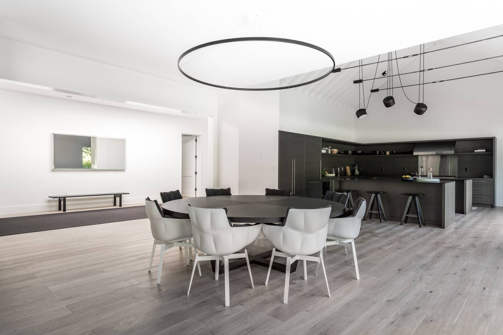42 Old Noyack Path Sag Harbor, NY 11963 - Photo 10 of 43 a view of a dining room with furniture and wooden floor