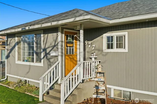 a view of a house with wooden walls